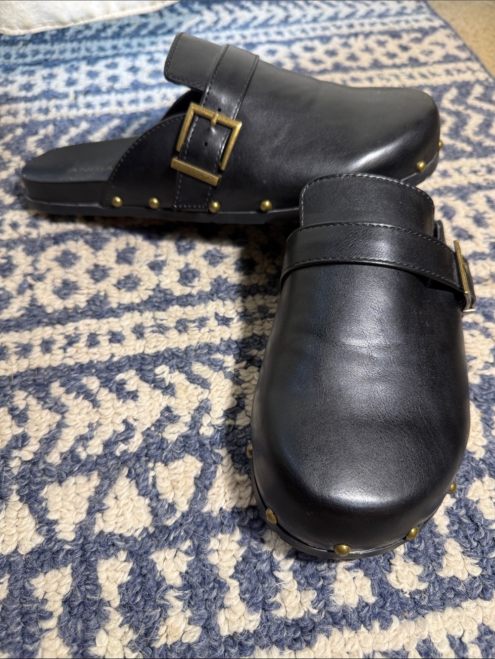 Women's Black Leather Mule Clogs with Buckle Detail